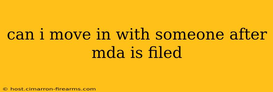 can i move in with someone after mda is filed